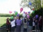 TC Club chilren releasing balloons