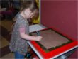 We draw a picture on the clay